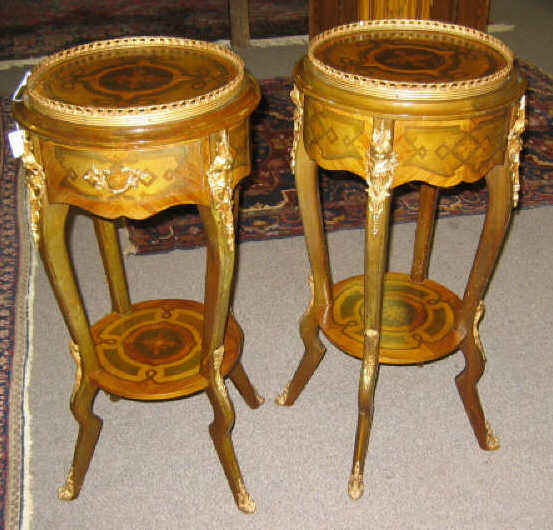 Appraisal: PAIR OF LOUIS XV STYLE ORMOLU URN STANDS Inlaid circular