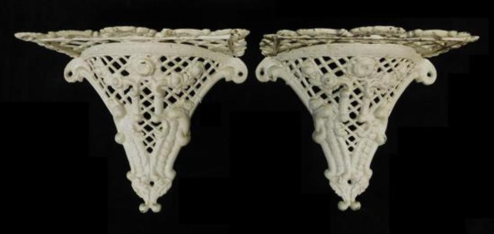 Appraisal: Pair of cast iron wall bracket shelves pierced lattice design