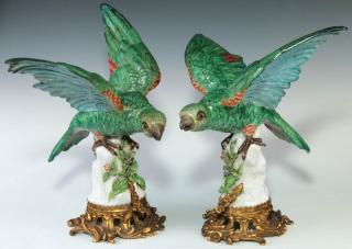 Appraisal: CIRCA LOUIS XV ORMOLU-MOUNTED PORCELAIN PARROTS A CIRCA CENTER TABLE