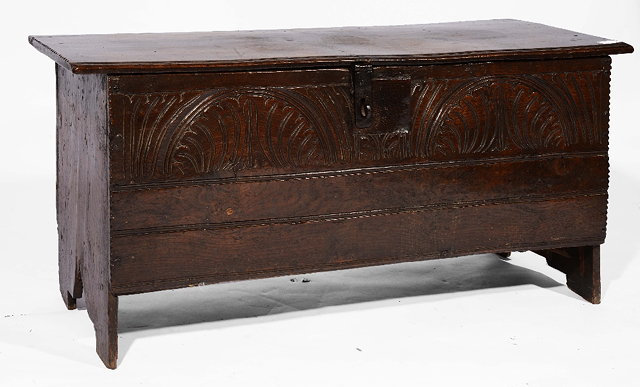 Appraisal: A late th Century oak sword chestwith carved front and