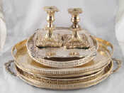 Appraisal: A quantity of silver plated holloware comprising four galleried trays