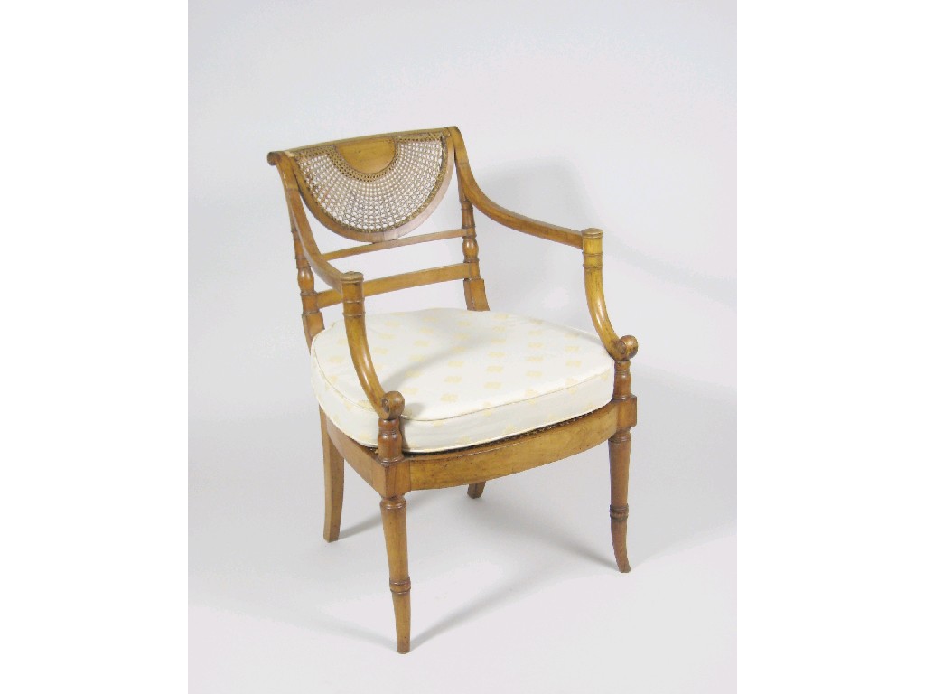 Appraisal: An early th Century beech Elbow Chair in the Egyptian