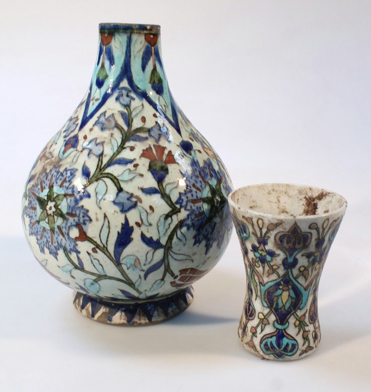 Appraisal: An Iznik Turkish pottery vase the globular body polychrome profusely