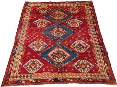 Appraisal: A Persian Shiraz Rug Apprx '- x '- Low wool