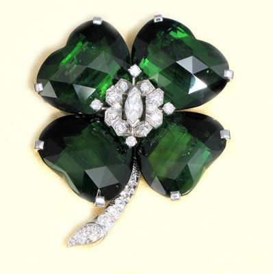 Appraisal: A tourmaline and diamond flower head brooch in the form