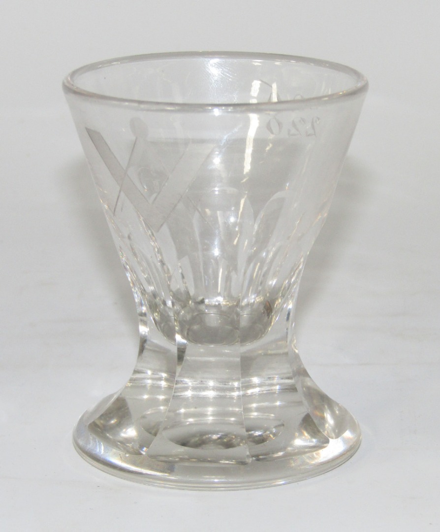 Appraisal: A thC Masonic toasting glass having flared trumpet bowl faceted