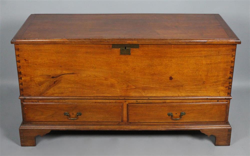 Appraisal: AMERICAN CHIPPENDALE WALNUT BLANKET CHEST the rectangular hinged top over