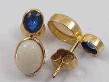 Appraisal: A pair of sapphire and opal earrings set in yellow