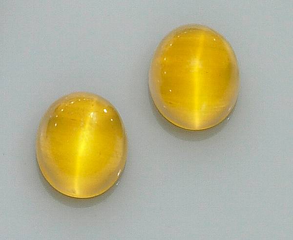 Appraisal: Pair of Cat s Eye Yellow Beryls Brazil It is