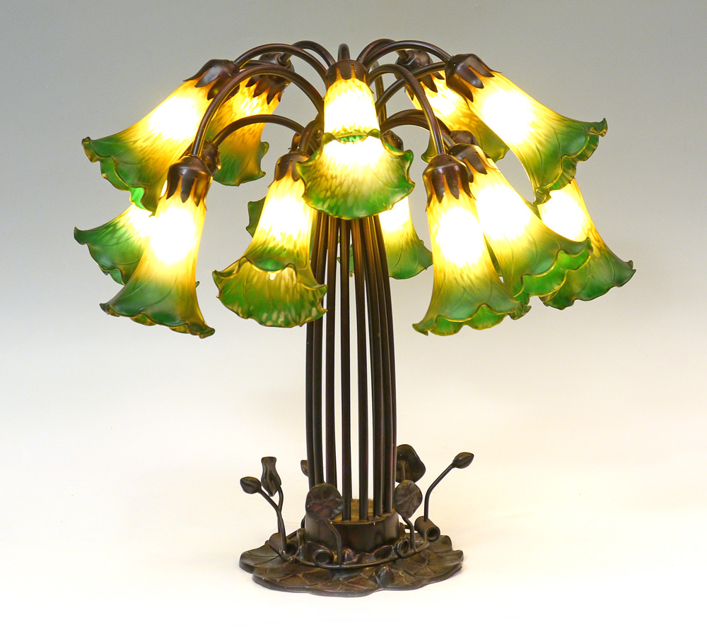 Appraisal: TIFFANY STYLE LIGHT LILY LAMP In the style of Tiffany