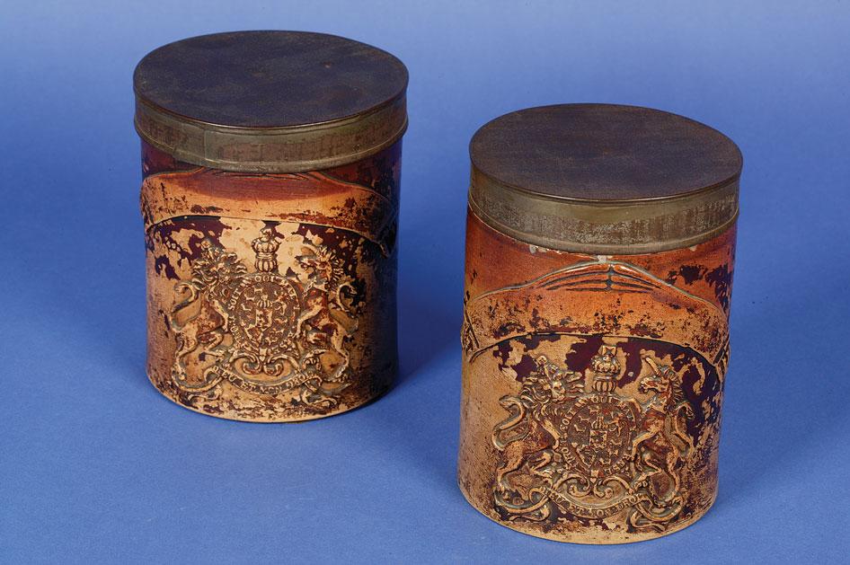 Appraisal: A STONEWARE STORAGE JAR moulded with the royal coat of