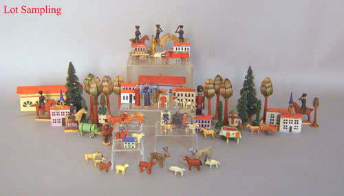 Appraisal: German carved and painted toy town with buildings animals soldiers