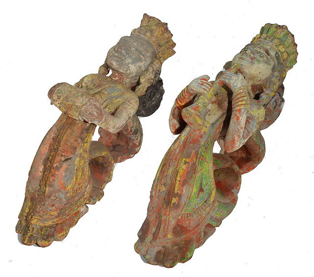 Appraisal: A PAIR OF PAINTED INDIAN BRACKETS each in the form