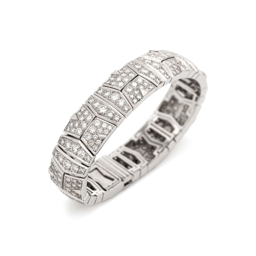 Appraisal: CARTIER DIAMOND BRACELET CARTIER DIAMOND BRACELET Containing numerous round brilliant