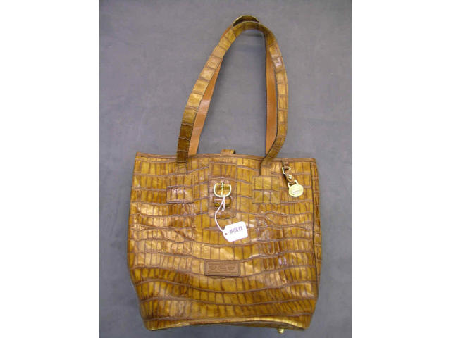 Appraisal: Dooney amp Bourke handbag with exotic pattern leather buckle front