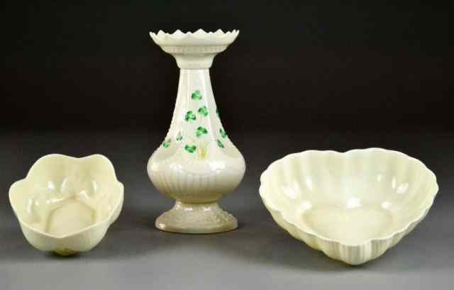 Appraisal: Pieces Belleek PorcelainTo include a tall vase with ruffled rim