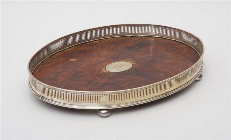 Appraisal: SILVER-PLATED BANDED AND OAK-INSET FOOTED GALLERIED TRAY TH CENTURY in