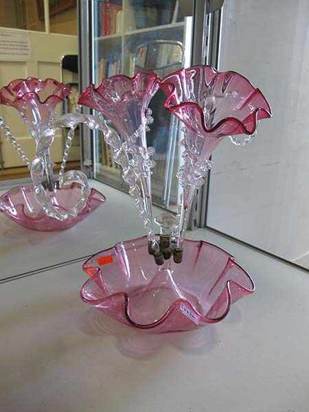 Appraisal: VICTORIAN RUBY GLASS TWO TRUMPET EPERGNE