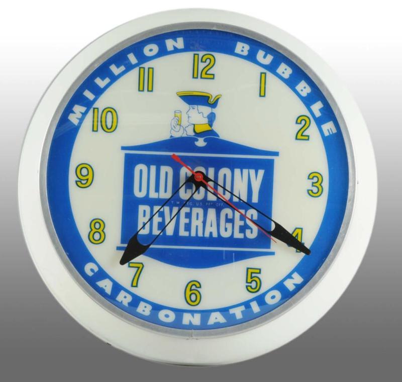 Appraisal: Old Colony Beverages Dualite Light-Up Clock Description Plastic border with