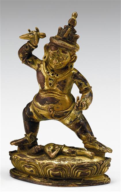 Appraisal: Sino-Tibetan gilt bronze figure of Malakala th century Standing figure