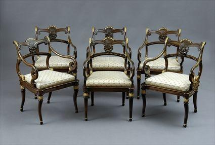 Appraisal: SET OF SIX REGENCY-STYLE FAUX ROSEWOOD PARCEL-GILT ARMCHAIRS Manufactured by