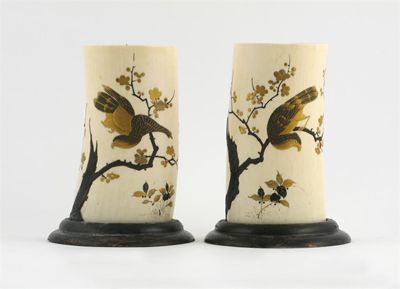 Appraisal: A pair of Japanese ivory tusk vases decorated in gold