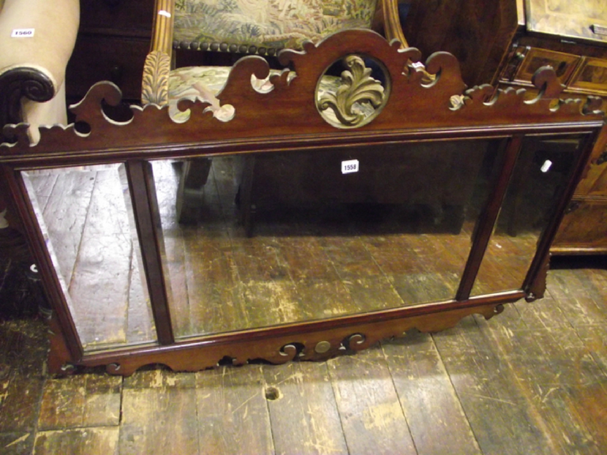 Appraisal: A Georgian style overmantle mirror the shaped and fretted mahogany