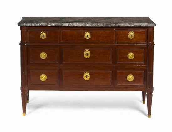 Appraisal: A Louis XVI Style Mahogany Commode having a rectangular marble