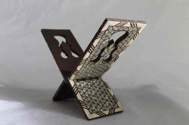 Appraisal: A DAMASCUS BOOK OR QUR'AN STAND with geometric mother of