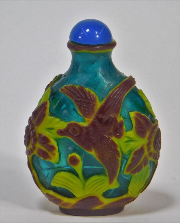 Appraisal: CHINESE CARVED PEKING GLASS BIRDS SNUFF BOTTLE China th CenturyThree