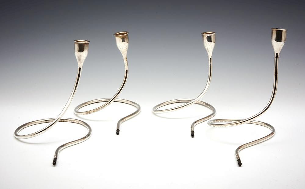 Appraisal: Four Towle mid century sterling asymmetrical candlesticks Four Towle mid