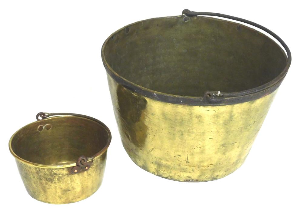 Appraisal: Two brass buckets the larger hammered brass iron rim with