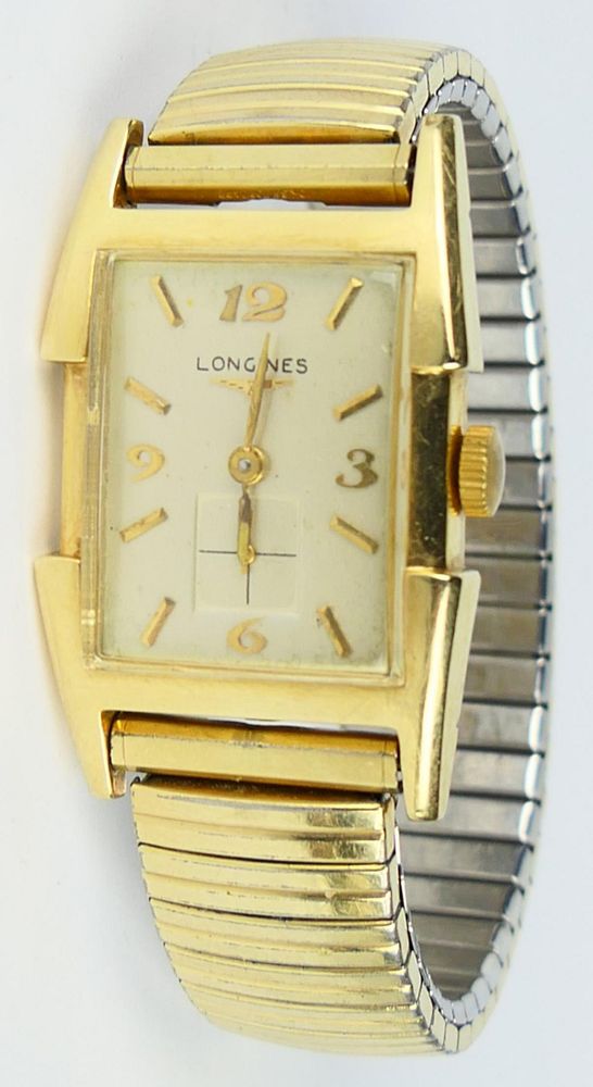 Appraisal: VINTAGE GENTS LONGINES GOLD TONE WATCH Mid century white dial