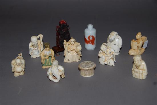 Appraisal: GROUP CARVED IVORY NETSUKES And oriental scent bottles lacking stopper