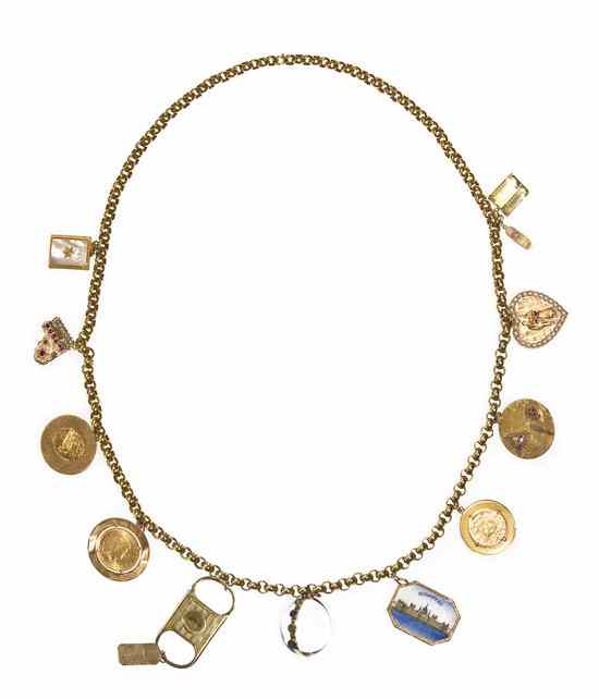 Appraisal: A Karat Yellow Gold Charm Necklace with Attached Charms consisting