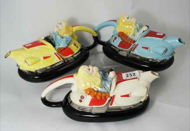 Appraisal: Silver Crane Novelty Teapots of a Woman in Bumper Cars