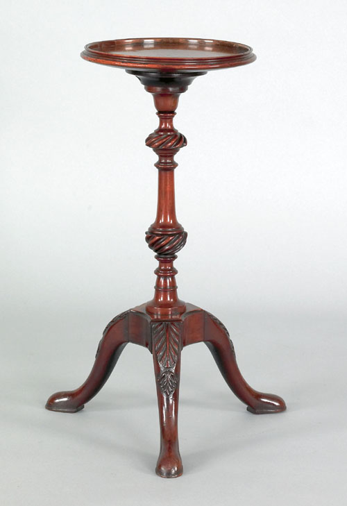 Appraisal: Georgian mahogany wine stand th c with carved standard and