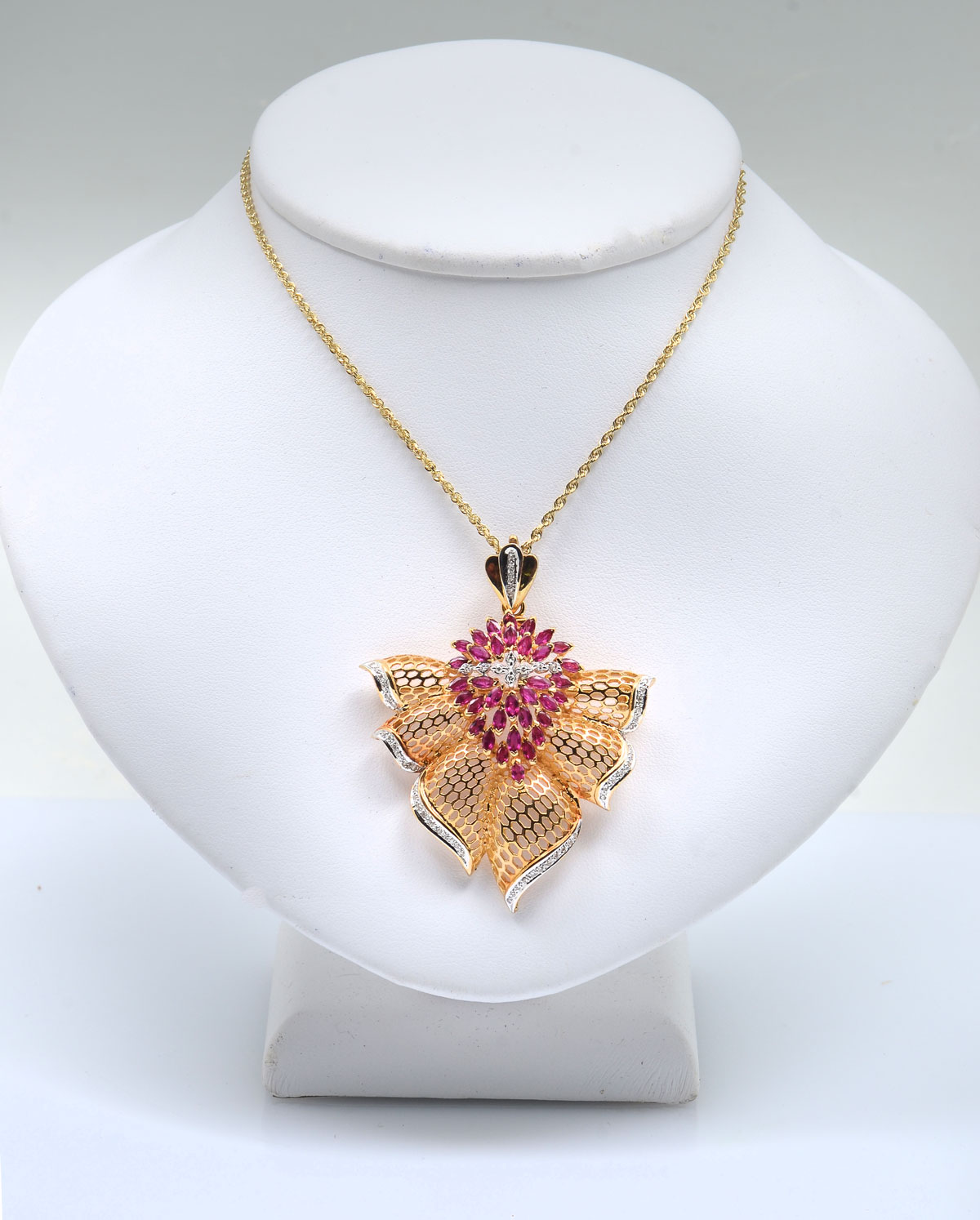 Appraisal: K DIAMOND RUBY LACEY PENDANT AND K CHAIN K rose