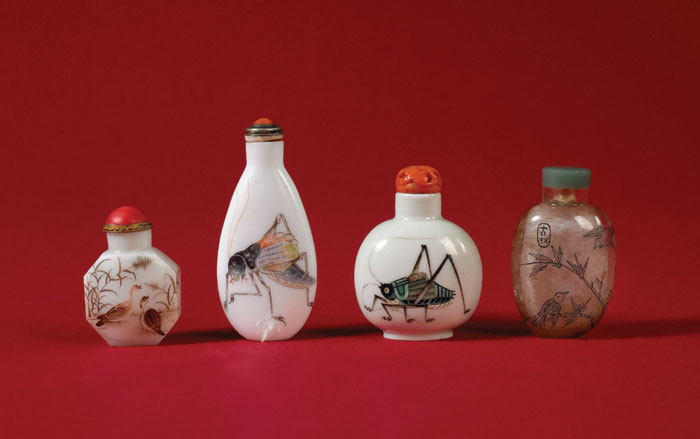 Appraisal: THREE CHINESE FAMILLE ROSE PORCELAIN SNUFF BOTTLES The first finely