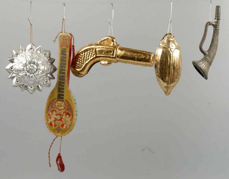 Appraisal: Lot of Dresden Christmas Ornaments Description Includes gun horn and