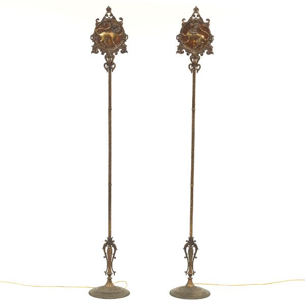 Appraisal: BRONZE AND IRON TORCHIERES MANNER OF OSCAR BACH Twisted stems