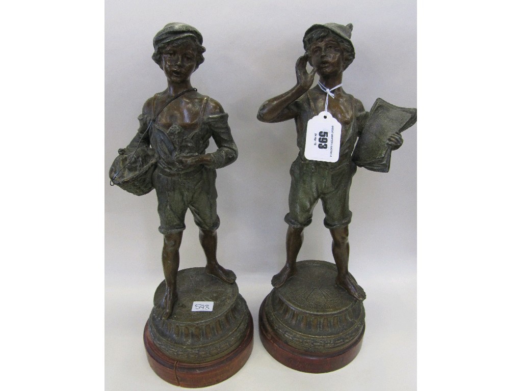 Appraisal: Pair of spelter figures to include a newspaper seller