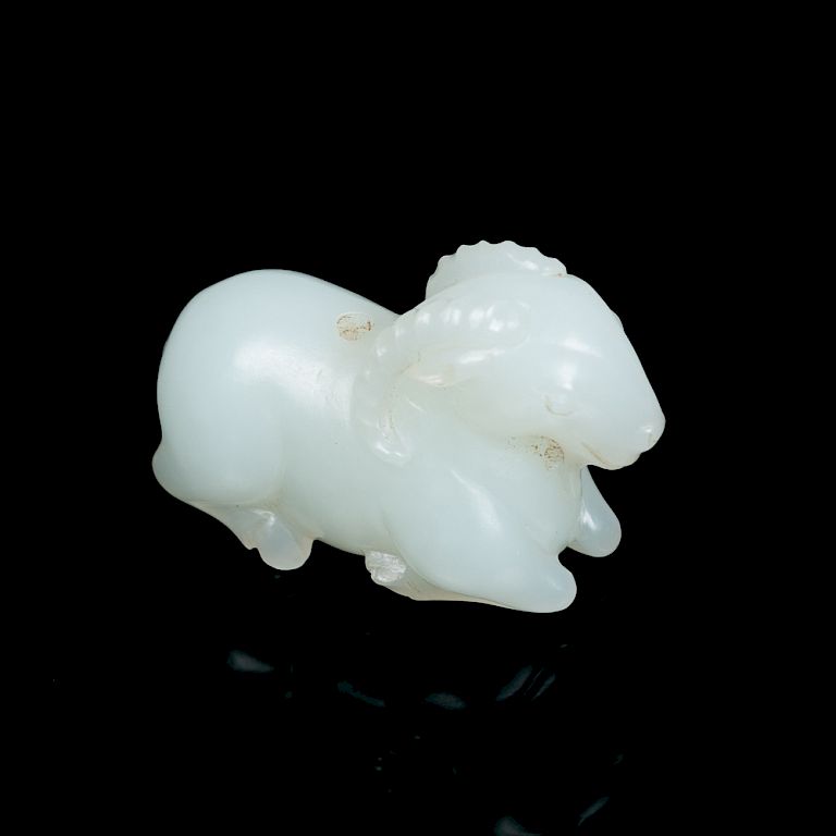 Appraisal: WHITE JADE GOAT REPUBLICAN Depicting a kneeling goat lively depicting