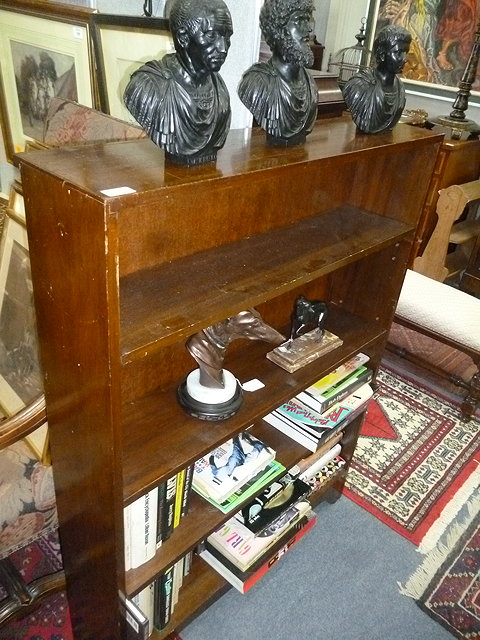 Appraisal: A PAIR OF HARDWOOD BOOKCASES with three adjustable shelves standing