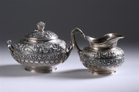 Appraisal: TIFFANY CO STERLING SILVER FLORAL REPOUSS CREAMER AND COVERED SUGAR