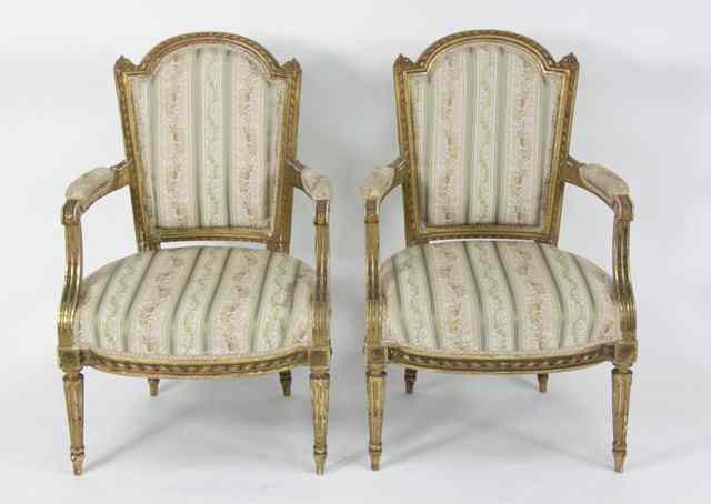 Appraisal: A pair of Louis XVI style giltwood open armchairs with