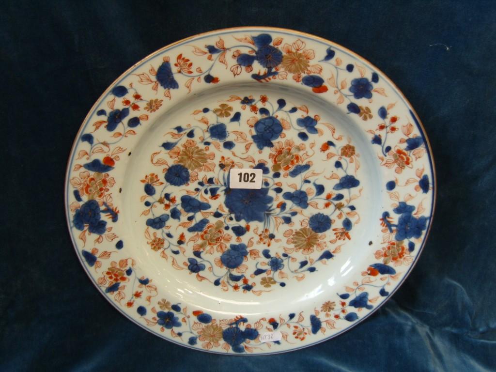 Appraisal: A th century Imari charger with trailing floral decoration together