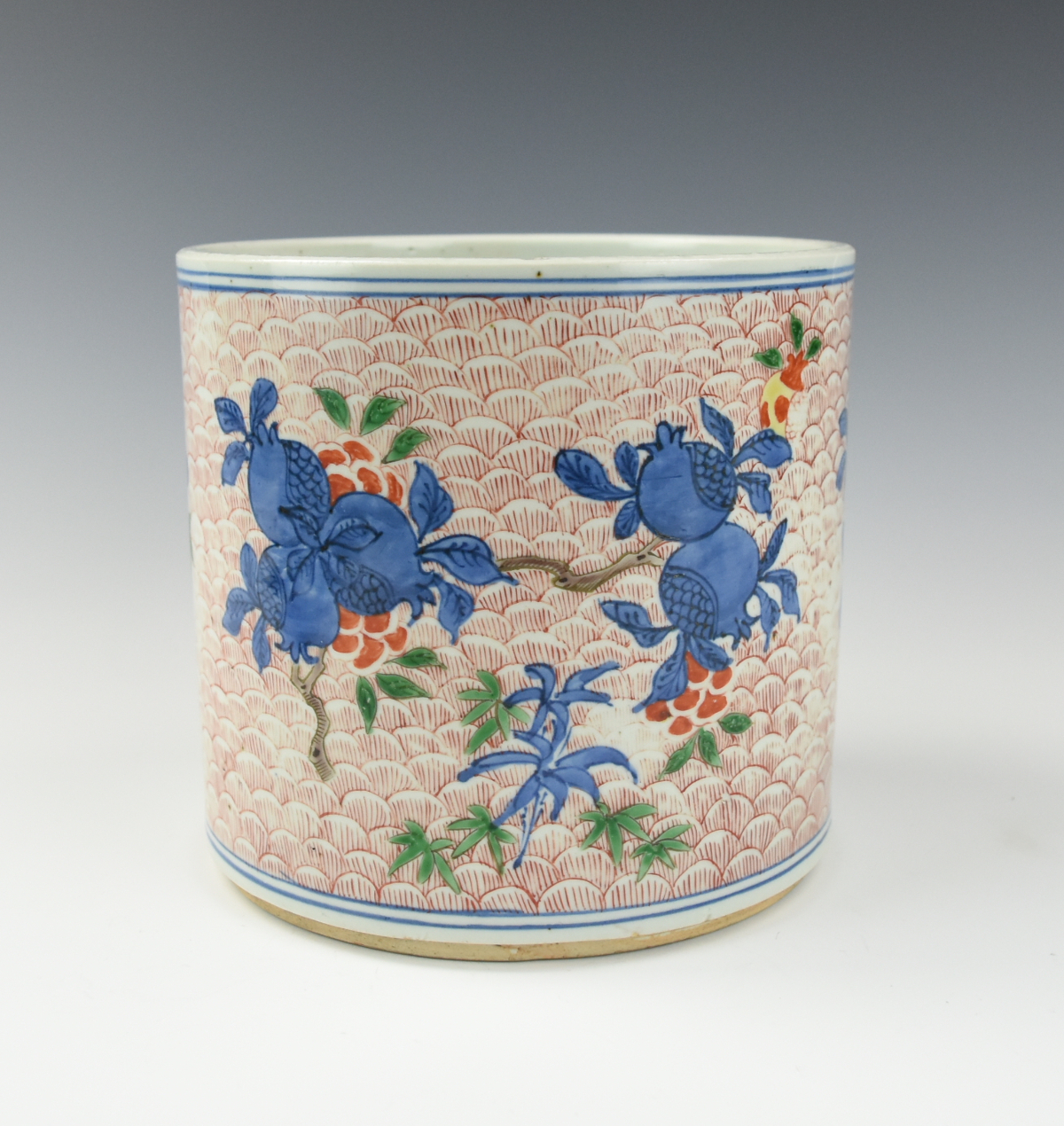 Appraisal: CHINESE BLUE FAMILE VERTE BRUSHPOT W POMEGRANATE the cylindrical body