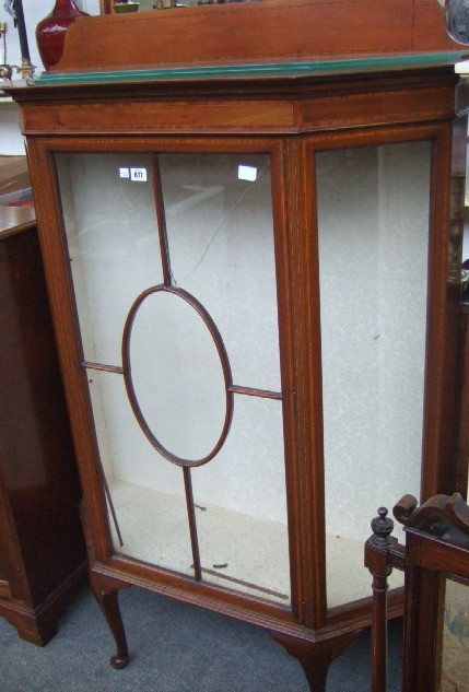 Appraisal: An Edwardian inlaid mahogany display cabinet the astragal glaze door