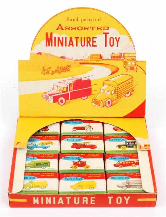 Appraisal: TRADE BOX OF TWELVE JAPANESE ANTIMONY MINIATURE VEHICLES circa s